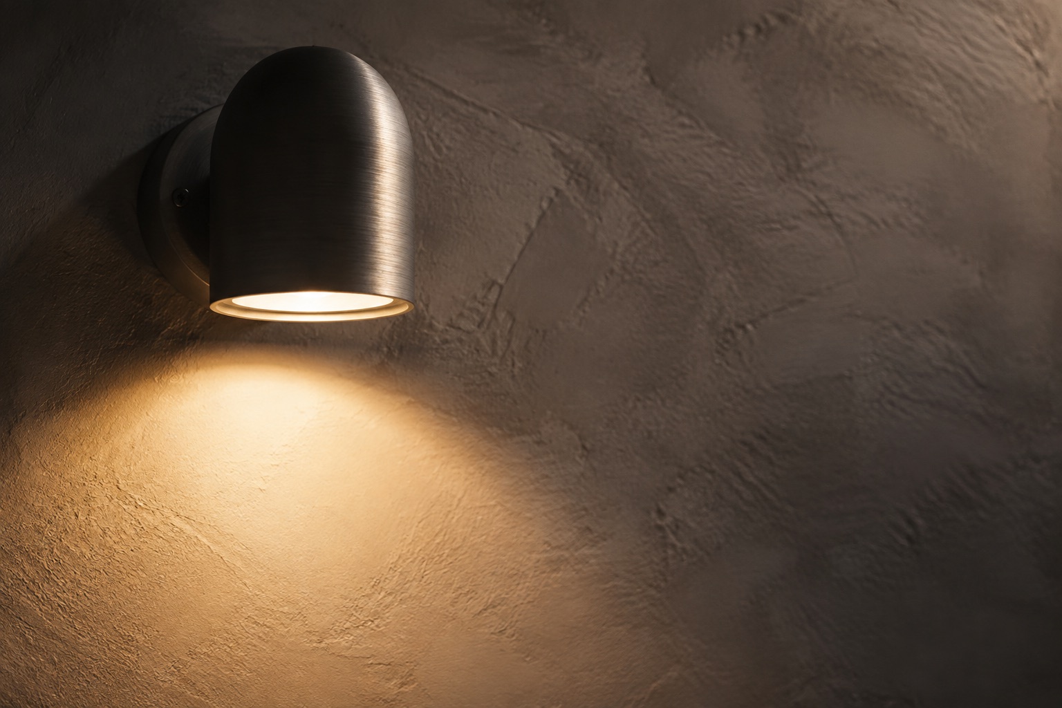 AI-generated concept: Wall light illuminating textured plaster